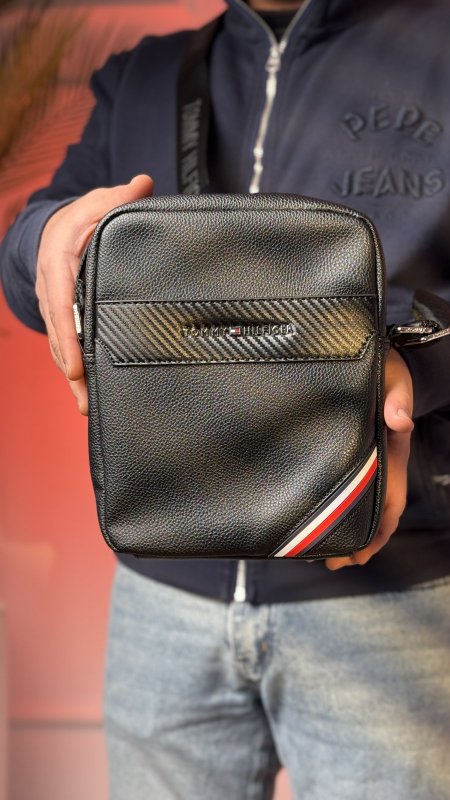 اسود شعار تومي