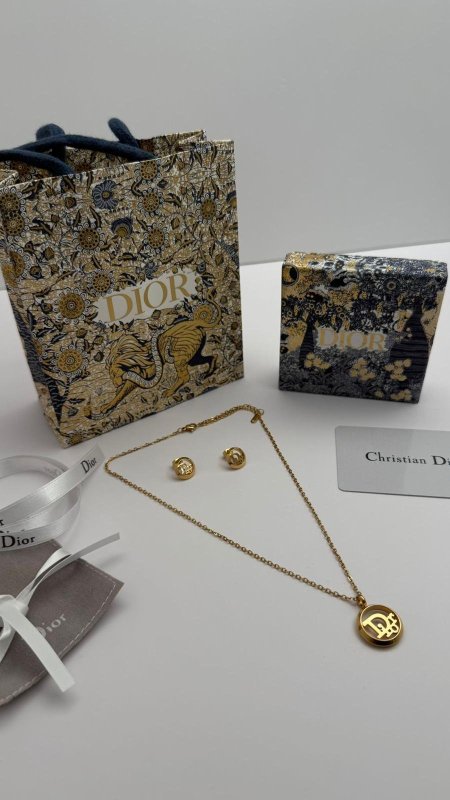 ذهبي / شعار ديور مدور مع اطار