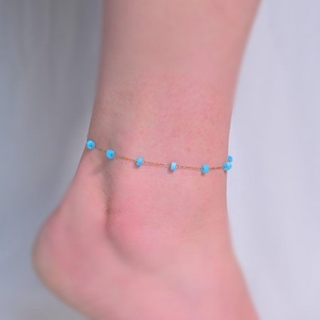 ذهبي مع حجر ازرق صغير