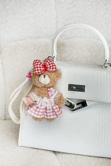 ميدالية دب بني تنورة