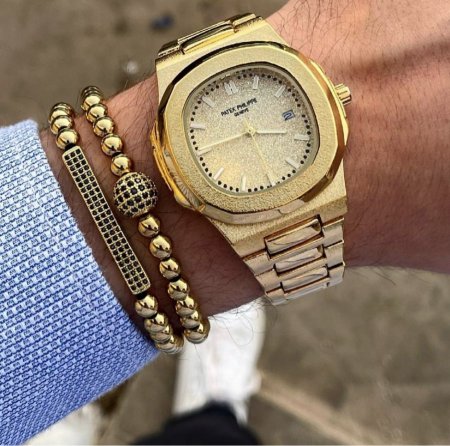 ساعة Patek Philippe   - ذهبي مع ذهبي