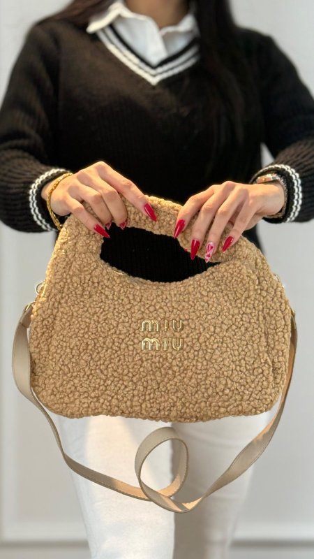 miu miu بني فاتح